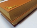изготовление твердого переплета книги с тиснением для рекламы